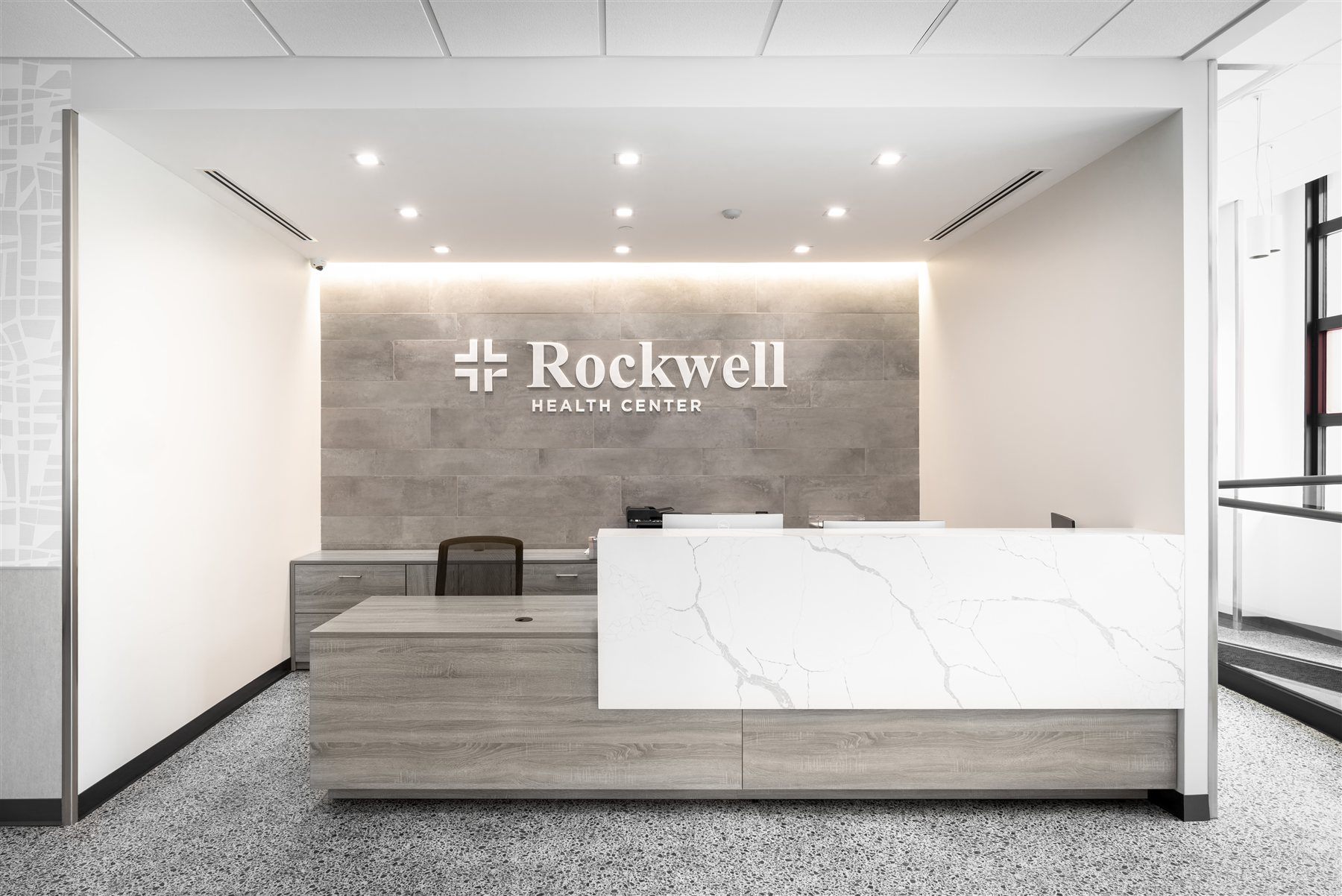 The Rockwell Health Center reception in Astoria, beneath the Rockwell sign